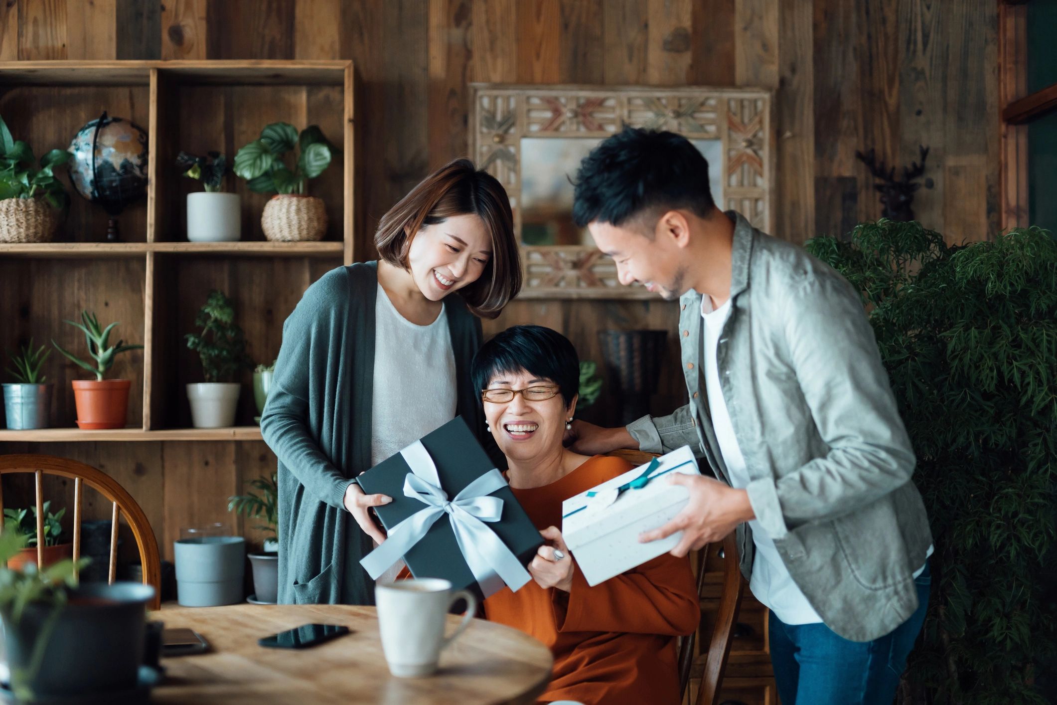 happy family receiving gift card